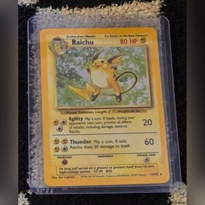 Base Set Raichu Pokémon card 14/102 1999 first edition